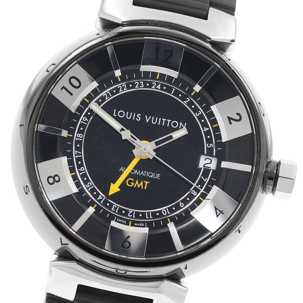 Mens Automatic GMT Wristwatch Louis Vuitton Tambour Q113I Black: Mens Automatic GMT Wristwatch Louis Vuitton Tambour Q113I Black This pre-owned Louis Vuitton Tambour GMT automatic men's wristwatch features a black design and Swiss origin. It is a wristwatch from th