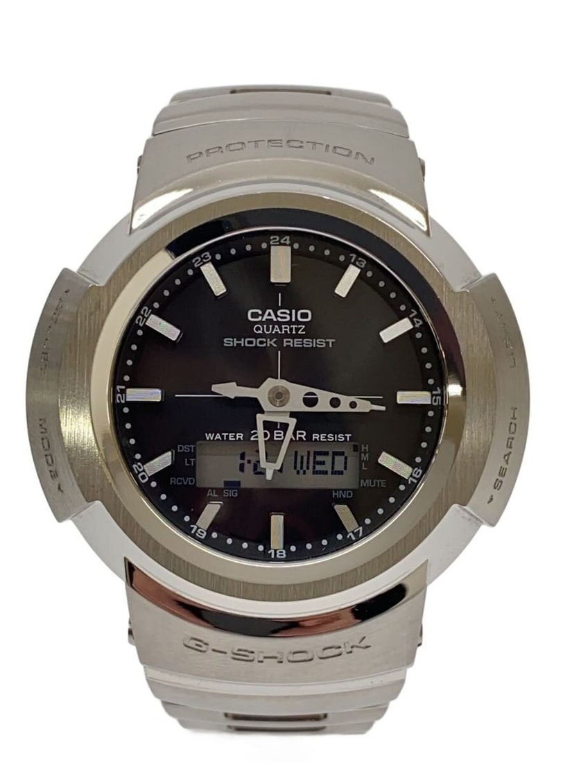 Casio G Shock AWM 500D Silver Stainless Steel Wristwatch: Casio G Shock AWM 500D Silver Stainless Steel Wristwatch This CASIO G-SHOCK AWM-500D men's wristwatch features a durable stainless steel construction in a silver finish. Made in Japan, this timepiece 