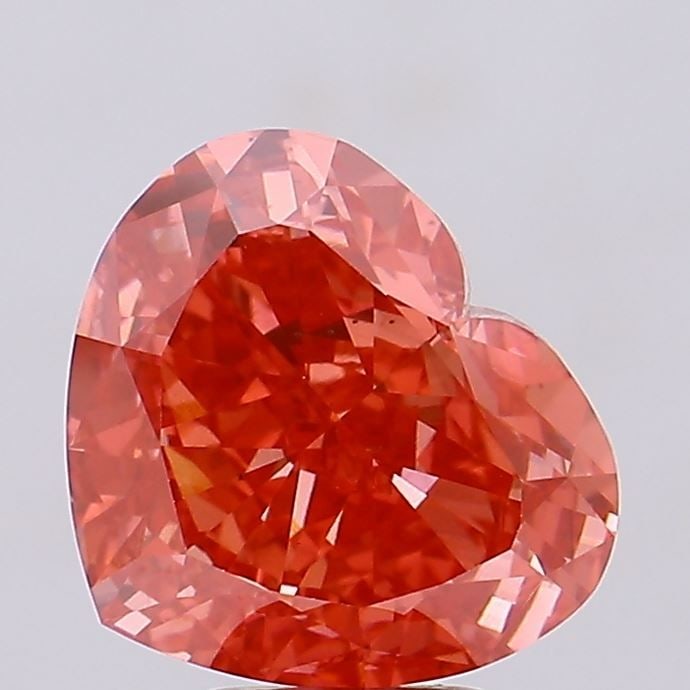 Loose Diamond - HEART 6.6ct Fancy Vivid Red VS1: Loose Diamond - HEART 6.6ct Fancy Vivid Red VS1 Source: This is a real non-mined Diamond that has been grown in a lab Shape: HEART Carats: 6.6 Color: Fancy Vivid Red Certification: IGI The Diamond Dep