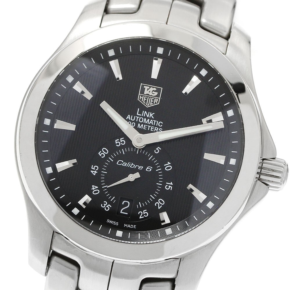 TAG Heuer Link Caliber 6 Automatic Date Men's Stainless Steel Watch: TAG Heuer Link Caliber 6 Automatic Date Men's Stainless Steel Watch This TAG Heuer Link Caliber 6 Date Automatic men's wristwatch features a stainless steel case and band with a black dial. The watch 