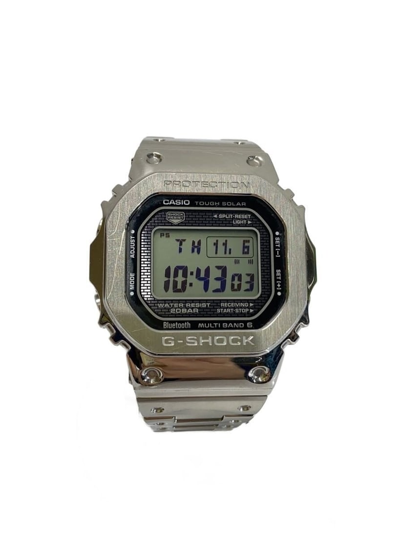 Casio G Shock Stainless Steel Wristwatch for Men: Casio G Shock Stainless Steel Wristwatch for Men This CASIO G-SHOCK men's wristwatch features a durable stainless steel construction with materials sourced from Japan and is made in Japan. The watch i