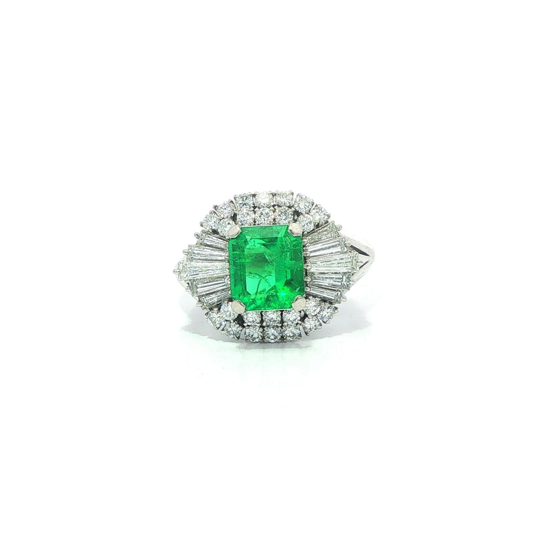 Platinum GIA Colombian Emerald Diamond Cocktail Ring 2.22ctw Size 5.5: Platinum GIA Colombian Emerald Diamond Cocktail Ring 2.22ctw Size 5.5 This vintage platinum cocktail ring features a high-quality, natural Colombian emerald as its centerpiece. The vivid green octagon