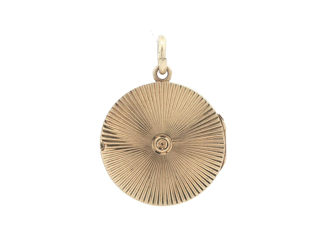 14k Yellow Gold Fluted Locket Pendant with Dual-Sided Round Design: 14k Yellow Gold Fluted Locket Pendant with Dual-Sided Round Design This locket pendant is crafted from solid 14k yellow gold and features a circular, dual-sided fluted design. The pendant includes an 