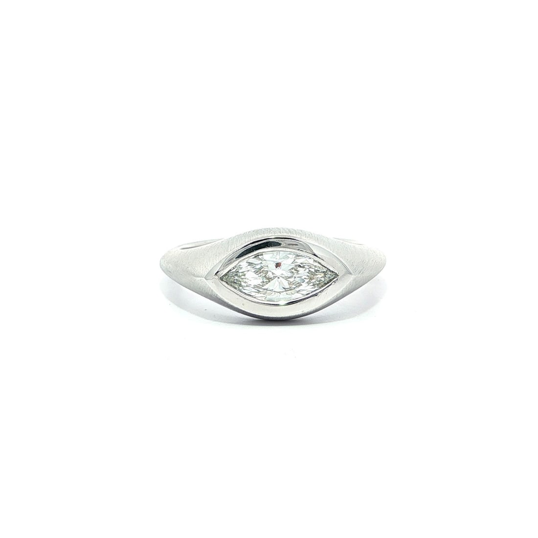 Platinum Bezel Marquise Diamond Ring GIA Certified 0.70ct F VS1: Platinum Bezel Marquise Diamond Ring GIA Certified 0.70ct F VS1 This stunning Platinum GIA Certified ring features a magnificent 0.70 ct marquise diamond, expertly bezel set to enhance its brilliance.