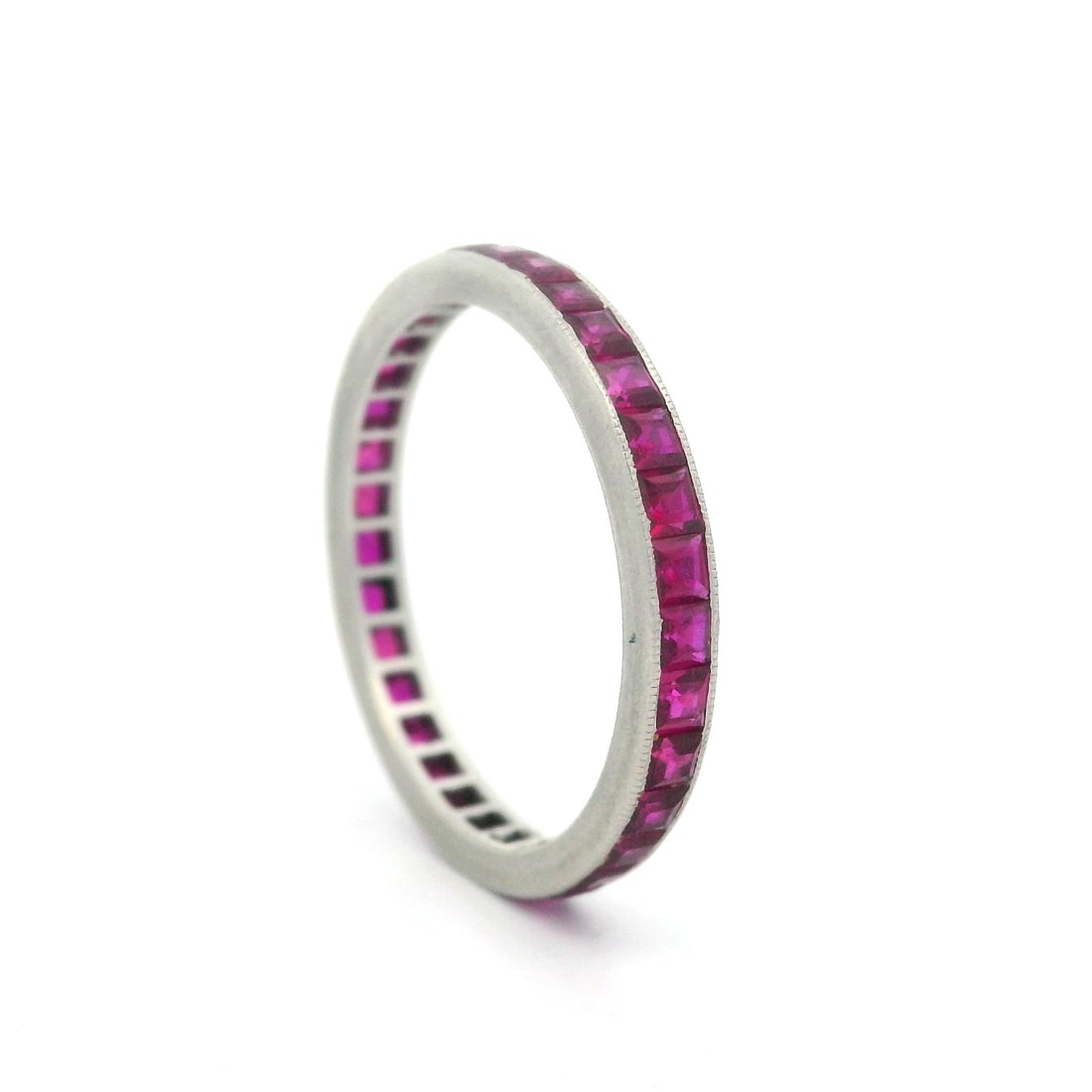 Antique Art Deco Platinum Eternity Band with GIA Lab Grown Ruby: Antique Art Deco Platinum Eternity Band with GIA Lab Grown Ruby This exquisite Antique Art Deco Platinum Eternity Stack Band features numerous square step cut lab-grown rubies, channel set to showcase