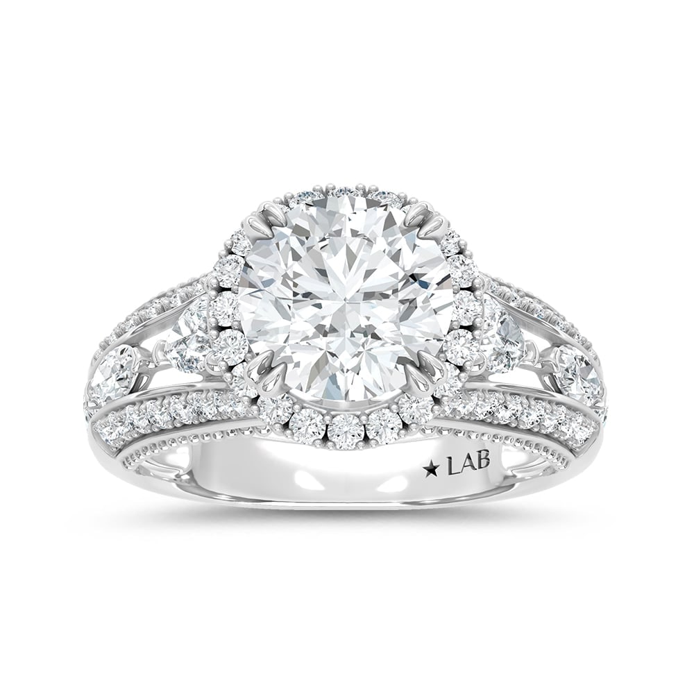 14K White Gold Lab Grown Diamond 3 1/3 Ct.Tw. Round Shape Engagement Ring: 14K White Gold Lab Grown Diamond 3 1/3 Ct.Tw. Round Shape Engagement Ring Celebrate your forever moment with the timeless brilliance of our Halo Diamond Engagement Ring. This exquisite piece features 