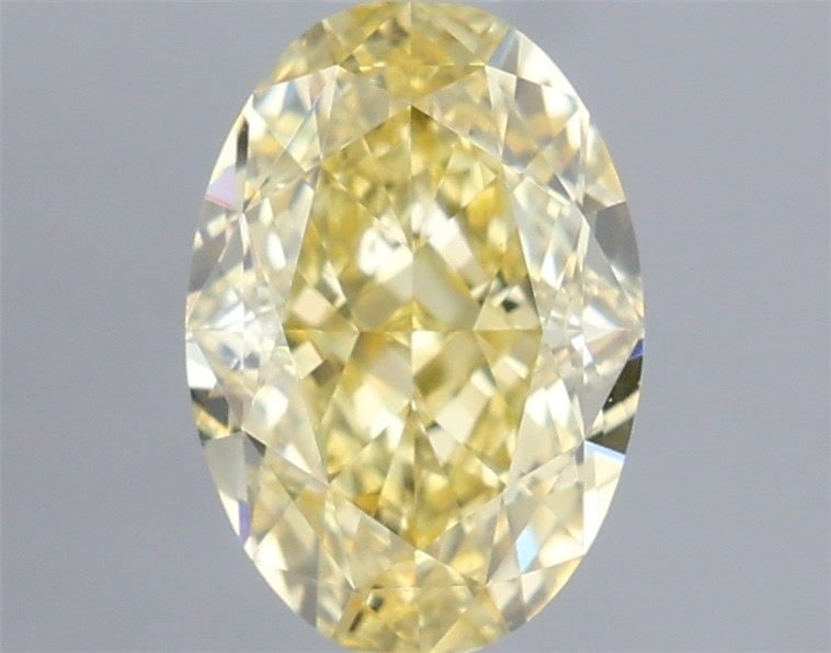 Loose Diamond - OVAL 1.07ct Fancy Yellow VVS2: Loose Diamond - OVAL 1.07ct Fancy Yellow VVS2 Source: This is a real non-mined Diamond that has been grown in a lab Shape: OVAL Carats: 1.07 Color: Fancy Yellow Certification: IGI Video: