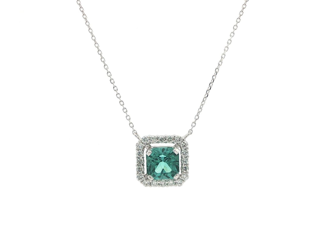GIA Greenish Blue Tourmaline Diamond Pendant in White Gold: GIA Greenish Blue Tourmaline Diamond Pendant in White Gold This elegant necklace features a rectangular, natural greenish blue tourmaline weighing 2.33 carats, framed by 20 round brilliant cut natural