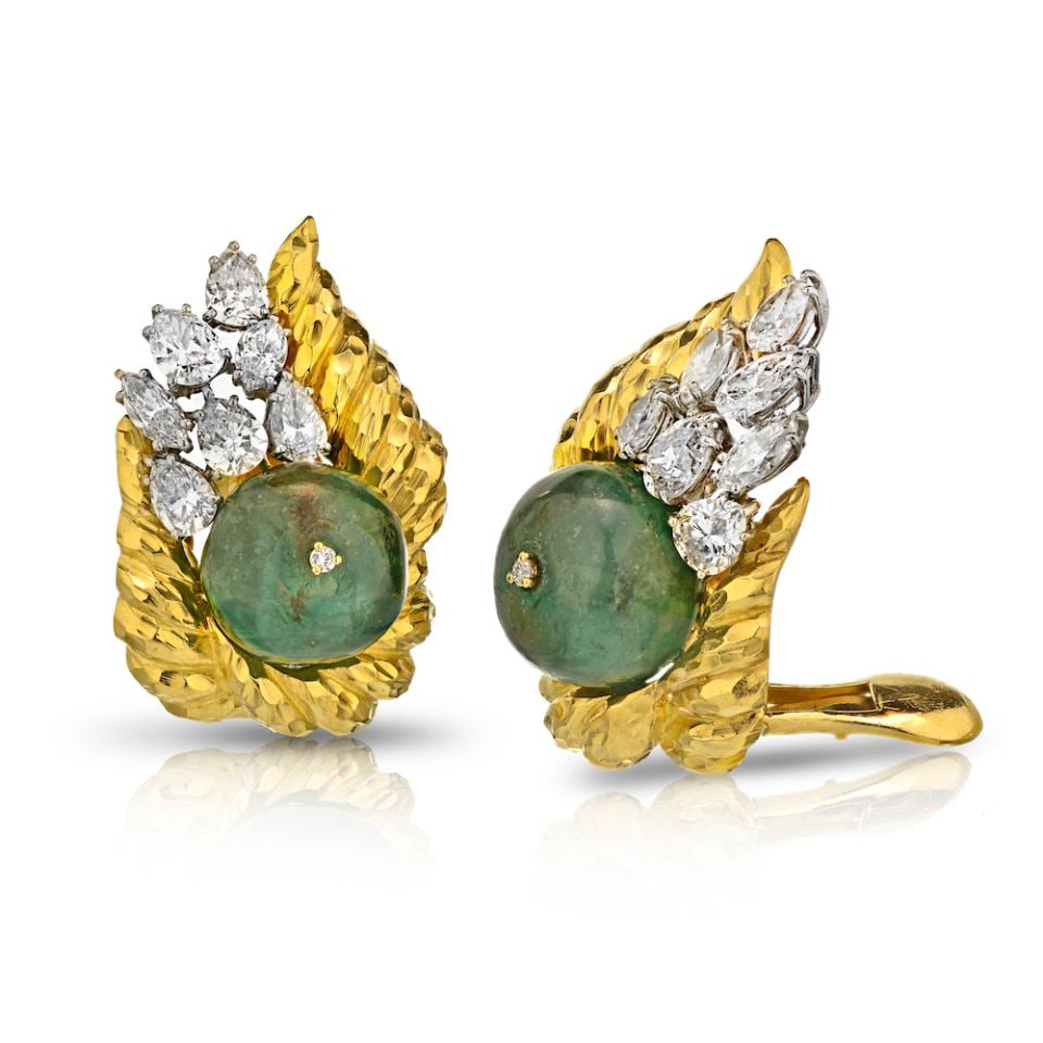 David Webb 18K Yellow Gold Diamond Emerald Clip-On Earrings: David Webb 18K Yellow Gold Diamond Emerald Clip-On Earrings These exquisite clip-on earrings by David Webb feature a luxurious design crafted from 18K yellow gold. Adorned with stunning diamonds and e