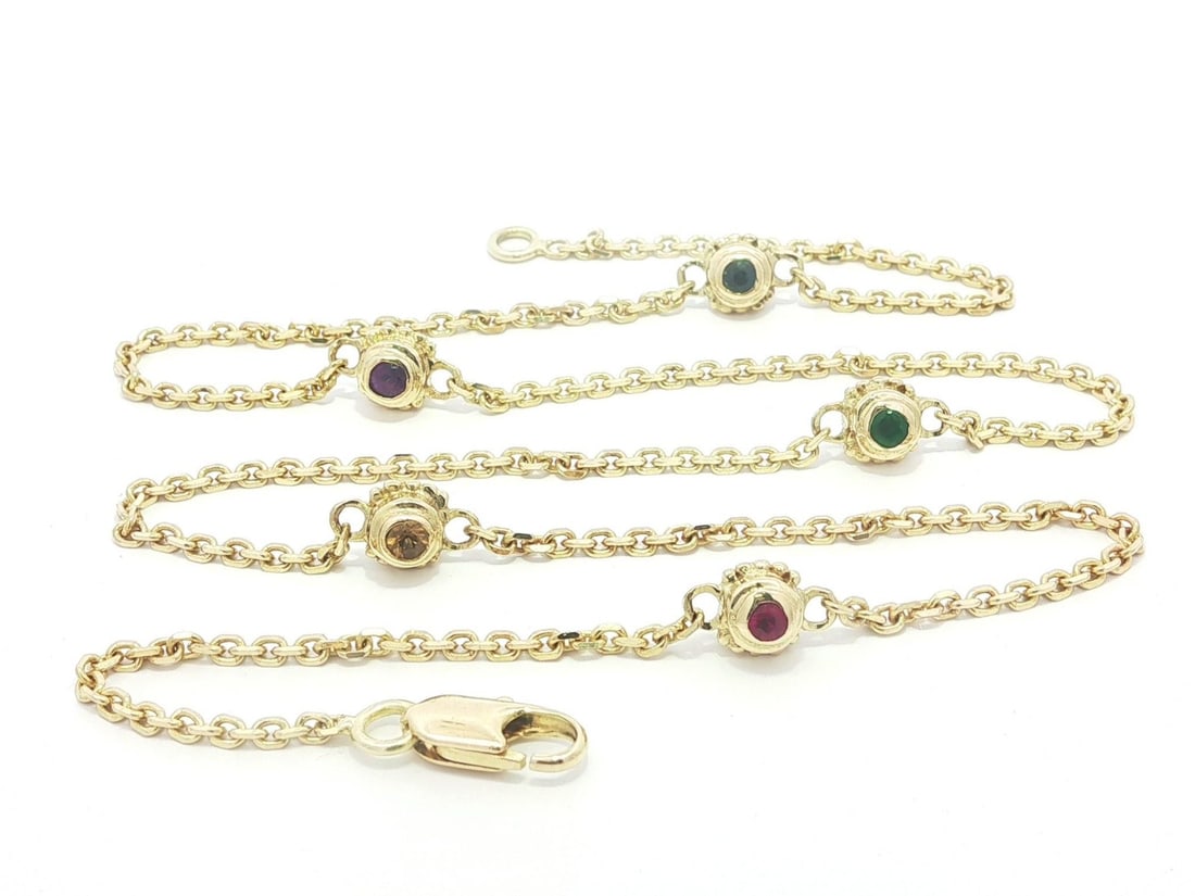 Yellow Gold Necklace with Ruby Emerald Sapphire Amethyst Citrine and Diamond Accents: Yellow Gold Necklace with Ruby Emerald Sapphire Amethyst Citrine and Diamond Accents This elegant station necklace is crafted from 14k solid yellow gold and features a combination of natural gemstones