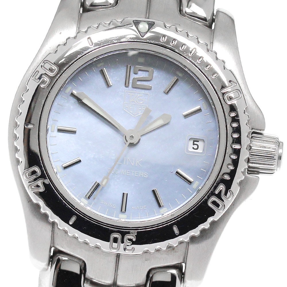 TAG Heuer Link WT141G Quartz Date Women's Stainless Steel Watch: TAG Heuer Link WT141G Quartz Date Women's Stainless Steel Watch This TAG HEUER Link Date Quartz women's wristwatch features a stainless steel case and bracelet, complemented by a blue shell dial. The 