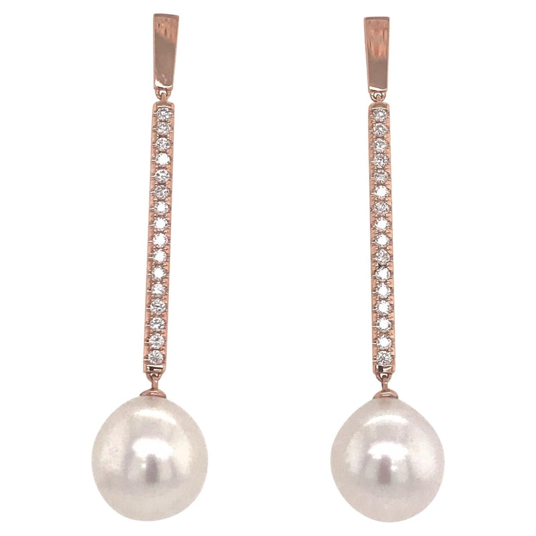 Harbor Diamonds 18K Rose Gold South Sea Pearl Diamond Drop Earrings 0.63 Carat: Harbor Diamonds 18K Rose Gold South Sea Pearl Diamond Drop Earrings 0.63 Carat Elevate your elegance with these stunning drop earrings crafted from 18K rose gold. Featuring two exquisite South Sea pea