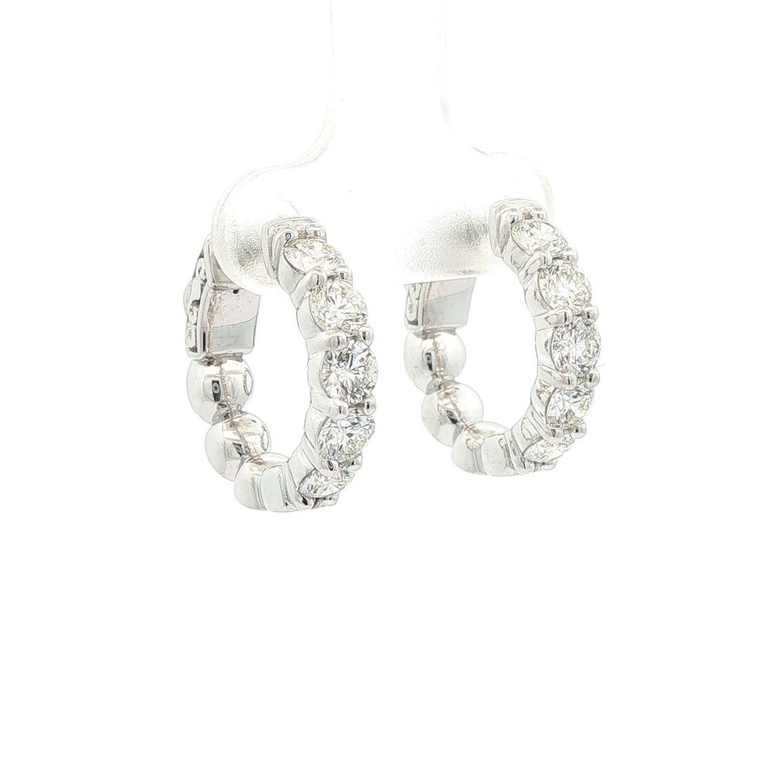 14k White Gold Diamond Huggie Hoop Earrings 2 ctw Hinged Latch Back: 14k White Gold Diamond Huggie Hoop Earrings 2 ctw Hinged Latch Back These elegant huggie hoop earrings are crafted from solid 14k white gold and feature a total of 10 natural round brilliant cut diamo