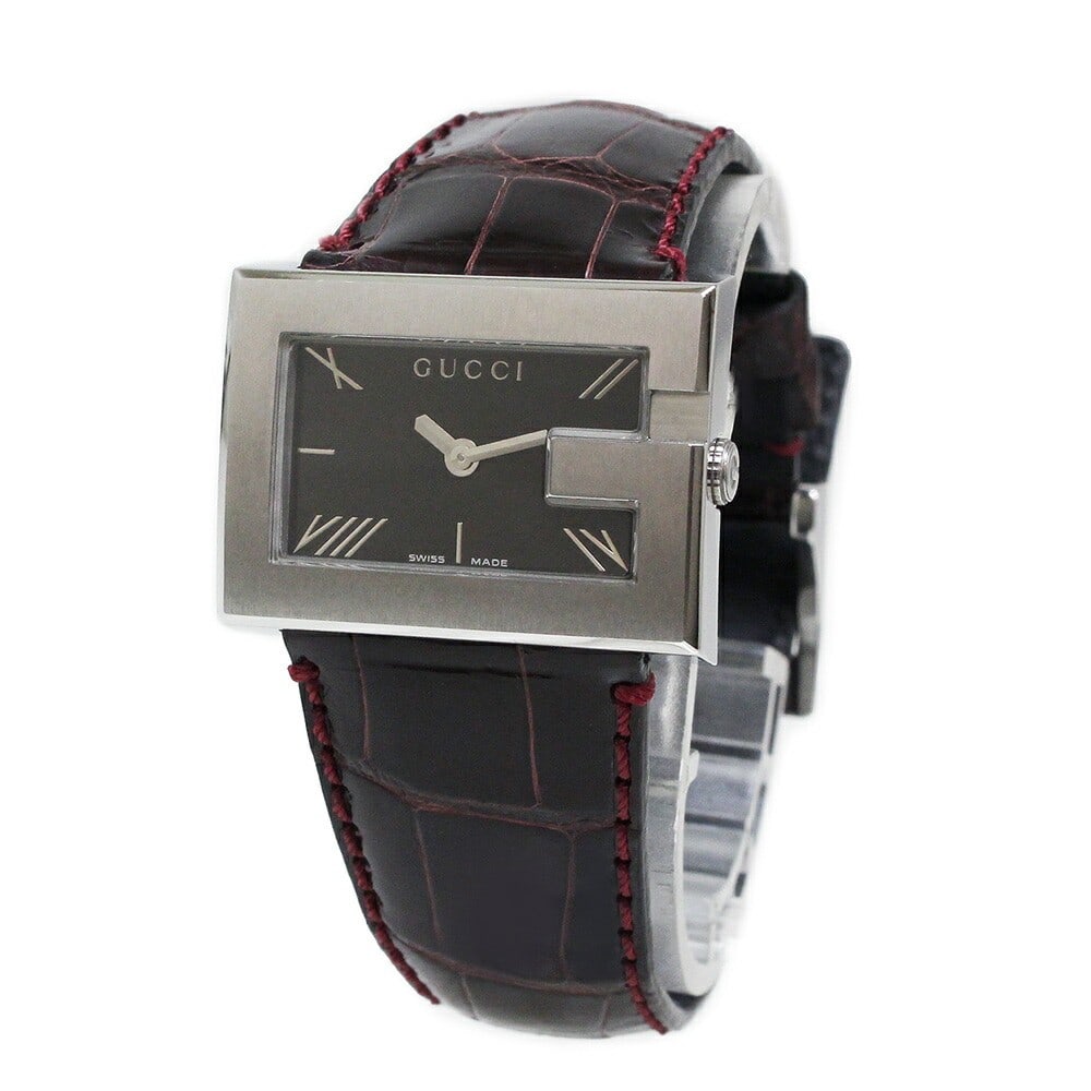 Gucci YA100501 G Shape Square Face Bordeaux Strap Wristwatch: Gucci YA100501 G Shape Square Face Bordeaux Strap Wristwatch This Gucci YA100501 wristwatch features a distinctive G-shaped square face and a luxurious bordeaux alligator leather strap. The silver sta