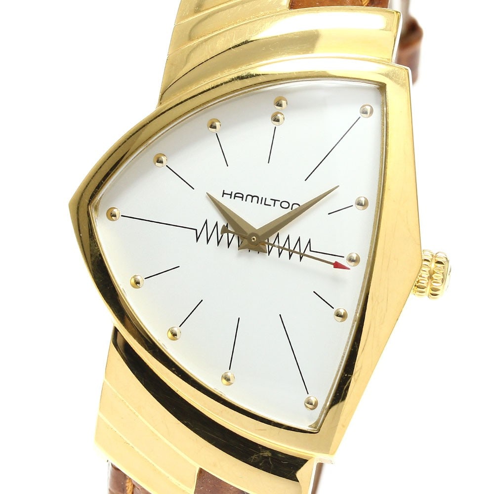 Hamilton Ventura H243010 Quartz Leather Strap Wristwatch: Hamilton Ventura H243010 Quartz Leather Strap Wristwatch This Hamilton Ventura H243010 men's wristwatch features a stainless steel and gold-plated case paired with a leather bracelet. The watch is pow