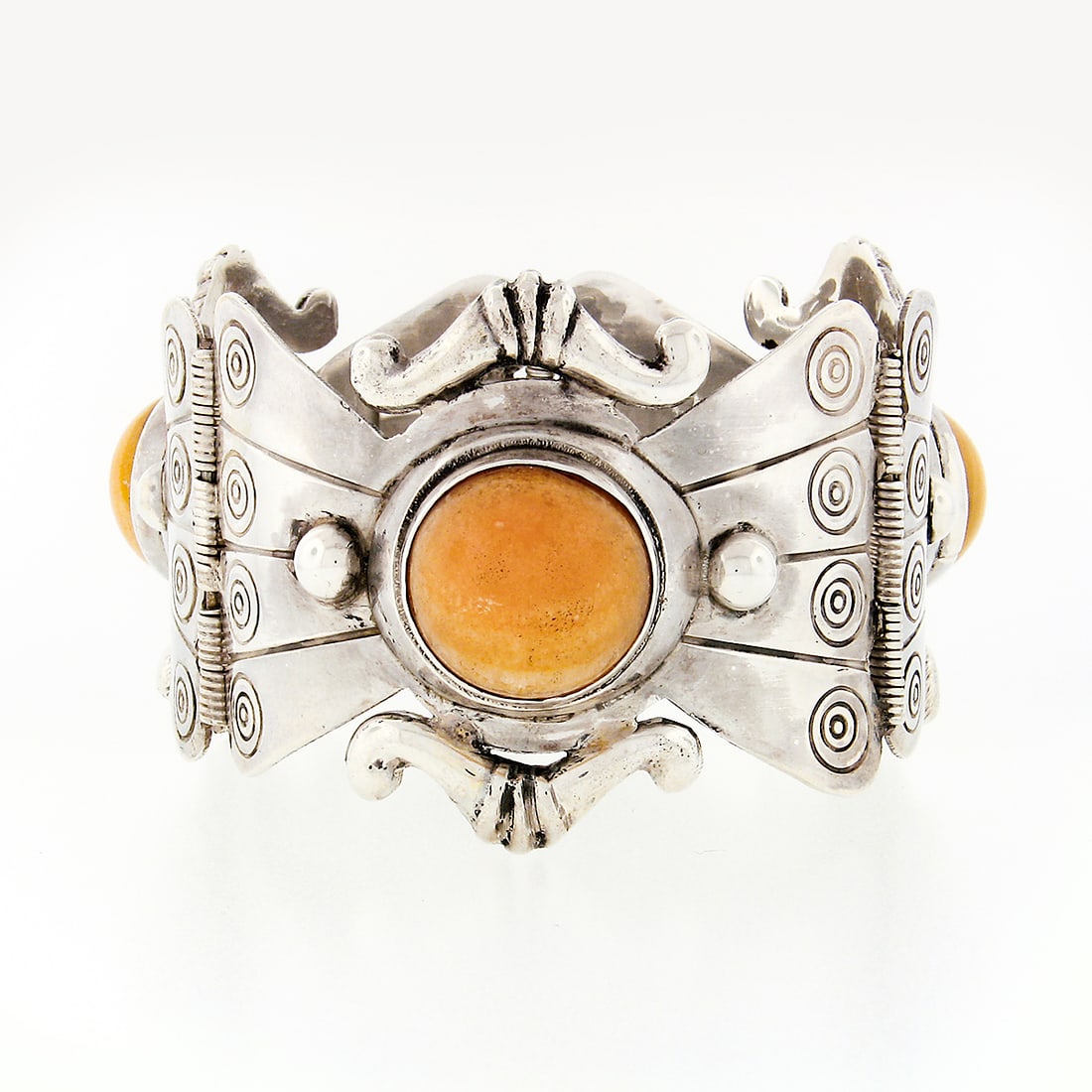 Handmade Vintage Mexican .925 Silver Wide Cuff Bracelet with Amber: Handmade Vintage Mexican .925 Silver Wide Cuff Bracelet with Amber This exquisite handmade vintage cuff bracelet showcases a stunning design crafted from solid .925 sterling silver. The bracelet featu
