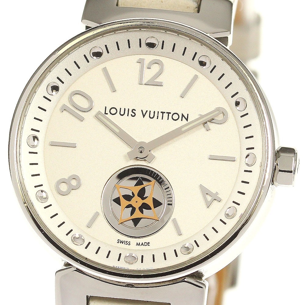 Louis Vuitton Tambour Moonstar Quartz Ladies Wristwatch Q8J10: Louis Vuitton Tambour Moonstar Quartz Ladies Wristwatch Q8J10 This Louis Vuitton Tambour Moonstar Quartz women's wristwatch features a stainless steel case and a white dial, complemented by a leather 