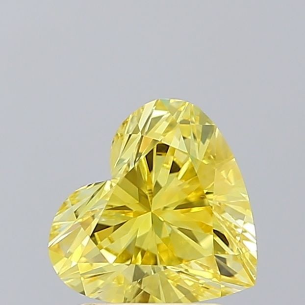 Loose Diamond - HEART 1.53ct Fancy Vivid Yellow VS1: Loose Diamond - HEART 1.53ct Fancy Vivid Yellow VS1 Source: This is a real non-mined Diamond that has been grown in a lab Shape: HEART Carats: 1.53 Color: Fancy Vivid Yellow Certification: IGI Video:
