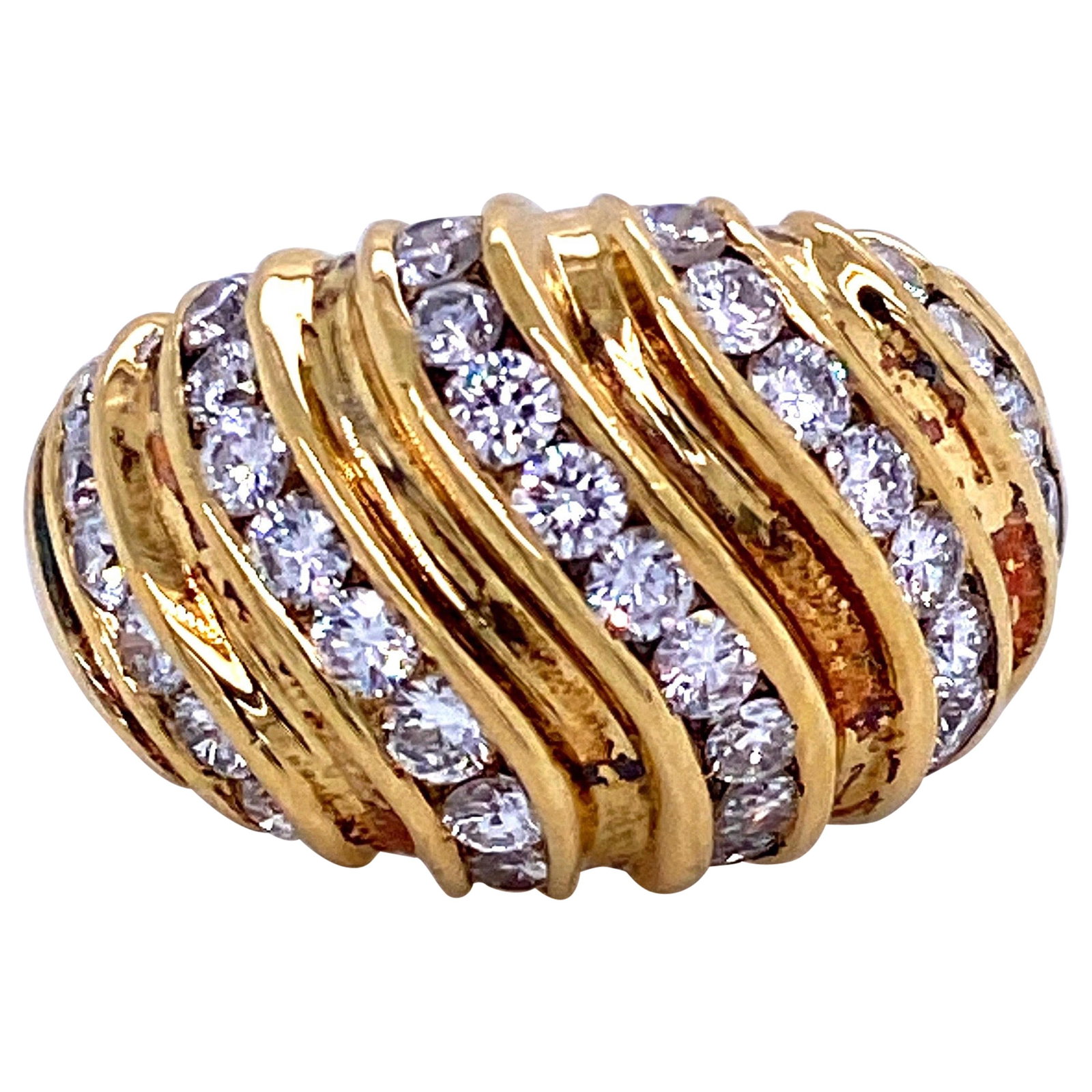 Contemporary 1.55 Carat Diamond Dome Ring in 18K Yellow Gold: Contemporary 1.55 Carat Diamond Dome Ring in 18K Yellow Gold This exquisite Diamond Swirl Dome Ring showcases a modern design crafted in 18K yellow gold. Adorned with 37 round brilliant diamonds, this