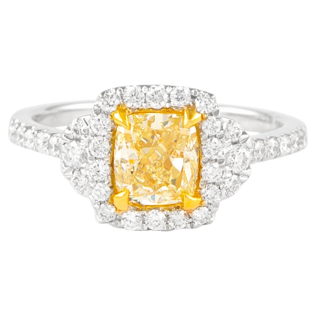 1.07ct Fancy Intense Yellow Diamond Ring 18k Two-Tone EGL Certified: 1.07ct Fancy Intense Yellow Diamond Ring 18k Two-Tone EGL Certified This stunning modern ring features a 1.07 ct cushion cut Fancy Intense Yellow diamond with SI2 clarity, certified by EGL. The total 