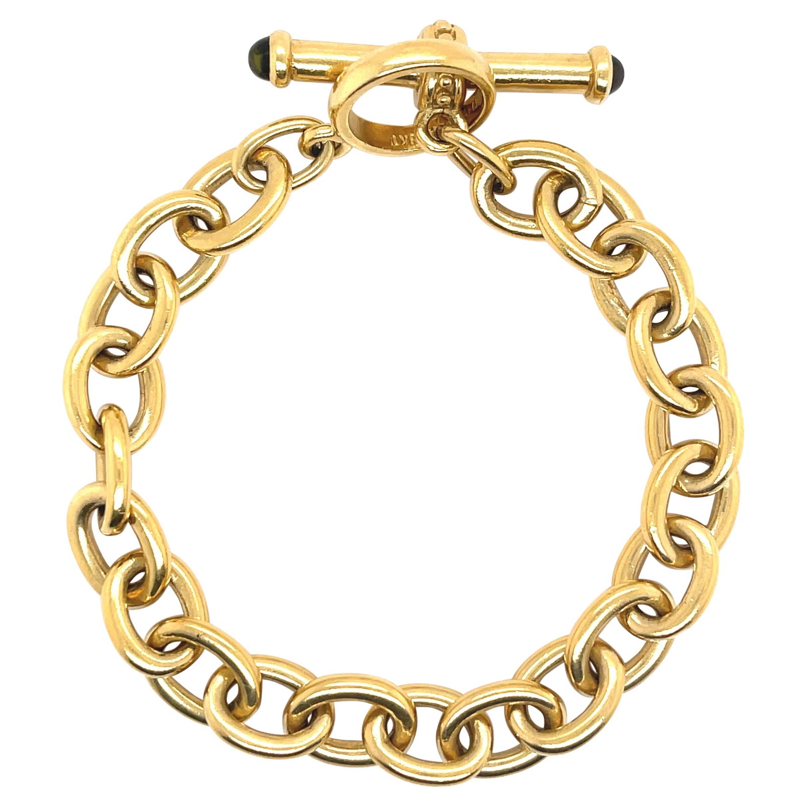 18K Yellow Gold Cable Bracelet with Peridots by Naltchayan: 18K Yellow Gold Cable Bracelet with Peridots by Naltchayan This exquisite 18K Yellow Gold cable bracelet features a contemporary design, accentuated by two stunning round-cut green peridots. Weighing 