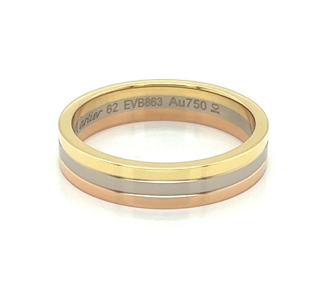 Cartier Vendome Louis tri color 18k gold band ring size 62 with certificate: Cartier Vendome Louis tri color 18k gold band ring size 62 with certificate This Cartier Vendome Louis band ring is crafted in 18k tri-color gold with a polished profile and no stone. It is signed and