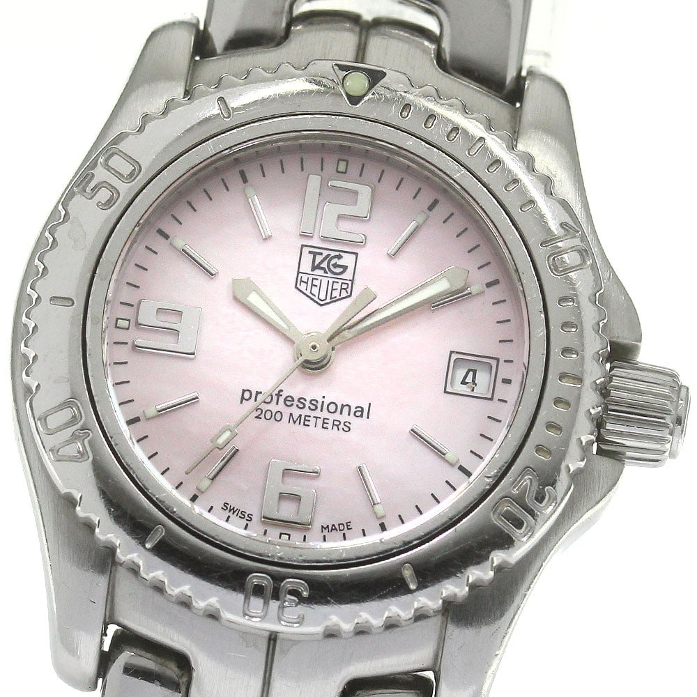 TAG Heuer Link Quartz Pink Shell Date Women's Wristwatch: TAG Heuer Link Quartz Pink Shell Date Women's Wristwatch This TAG HEUER Link Date Quartz women's wristwatch features a stainless steel case and bracelet with a pink shell dial. The watch is powered by