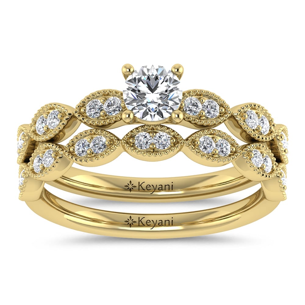 Diamond 1/2 Ct.Tw. Round Cut Bridal Ring in 14K Yellow Gold: Diamond 1/2 Ct.Tw. Round Cut Bridal Ring in 14K Yellow Gold 14k Yellow Gold Stone Color: G-h Stone Clarity: Si2 Each ring is presented in standard size 6.5. Complimentary resizing is available between