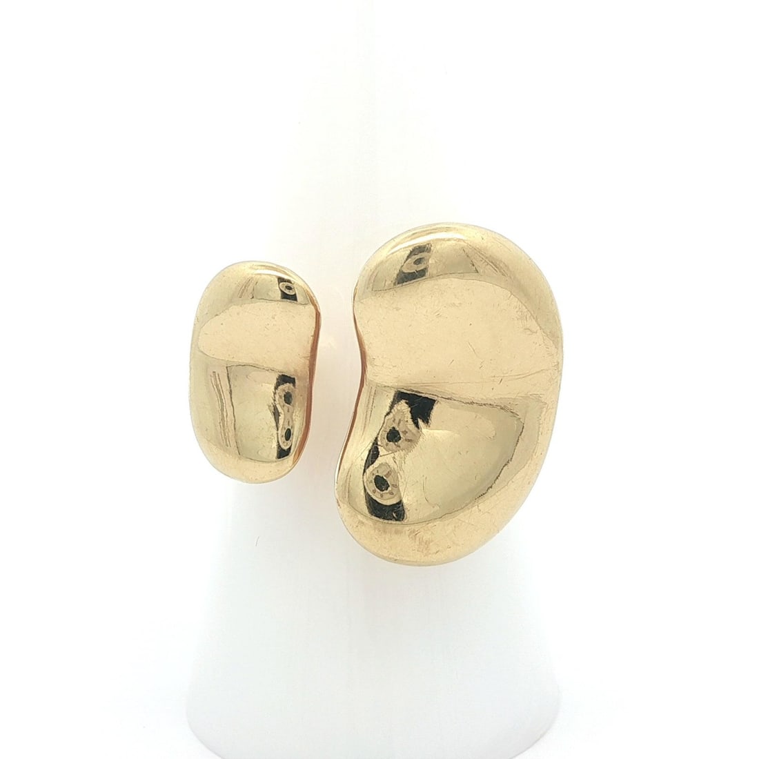 18k Yellow Gold Dual Bean Cocktail Ring by Peretti for Tiffany: 18k Yellow Gold Dual Bean Cocktail Ring by Peretti for Tiffany This vintage Tiffany & Co. Peretti ring features a distinctive dual bean design crafted in solid 18k yellow gold. Designed in a cocktail 