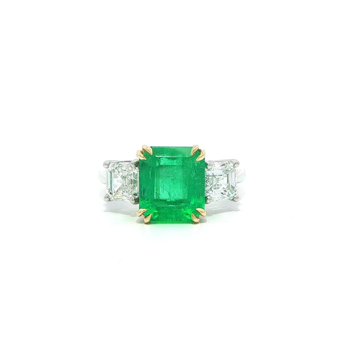 5.6ctw GIA Colombian Emerald and Diamond Three Stone Platinum Gold Cocktail Ring: 5.6ctw GIA Colombian Emerald and Diamond Three Stone Platinum Gold Cocktail Ring This un-used cocktail ring features a stunning combination of a natural Colombian emerald and Asscher cut diamonds, all