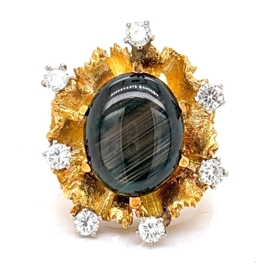 1960s 18K Yellow Gold Star Sapphire Diamond Ring 10.00 Ct: 1960s 18K Yellow Gold Star Sapphire Diamond Ring 10.00 Ct This stunning 1960's ring is crafted from 18K yellow gold and features a beautiful star sapphire at its center. The star sapphire weighs appro