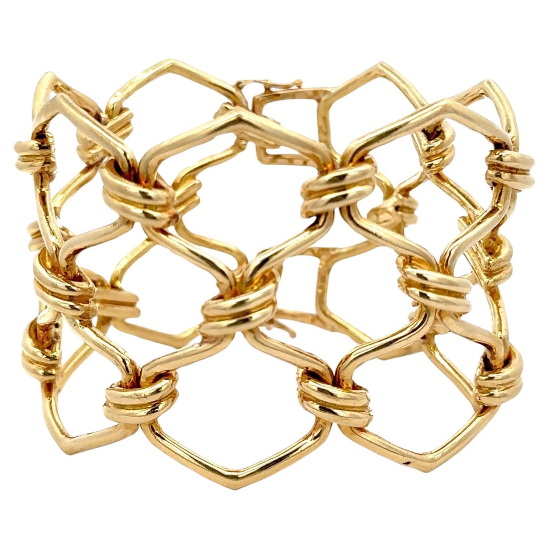Harbor Diamonds 18K Yellow Gold Twist Bangle Bracelet 120.8g 7.25in: Harbor Diamonds 18K Yellow Gold Twist Bangle Bracelet 120.8g 7.25in This stunning 18 karat yellow gold bangle bracelet features an elegant wire twist motif, making it a contemporary piece that adds a 