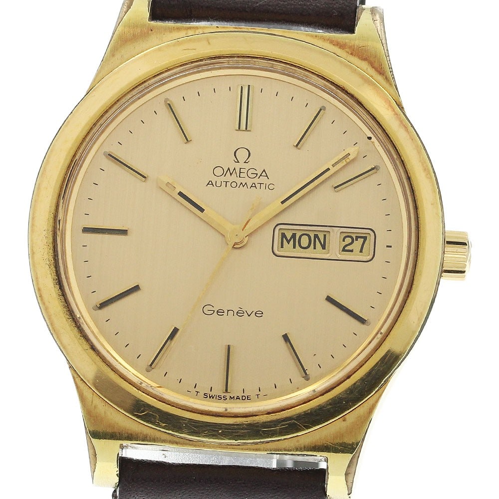 Omega Geneva 166.0169 Automatic Day-Date Men's Wristwatch: Omega Geneva 166.0169 Automatic Day-Date Men's Wristwatch This OMEGA Geneva Day-Date men's wristwatch features a stainless steel and gold-plated case with a gold dial and automatic movement (Caliber 1