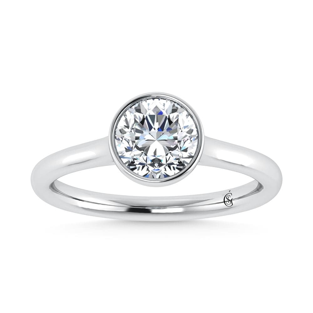 14K White Gold Lab Grown Diamond 1 1/2 Ct.Tw. Solitaire Engagement Ring: 14K White Gold Lab Grown Diamond 1 1/2 Ct.Tw. Solitaire Engagement Ring Crafted in luminous 14K white gold, this timeless solitaire engagement ring showcases a stunning 1 1/2 Ct.Tw. lab grown diamond.