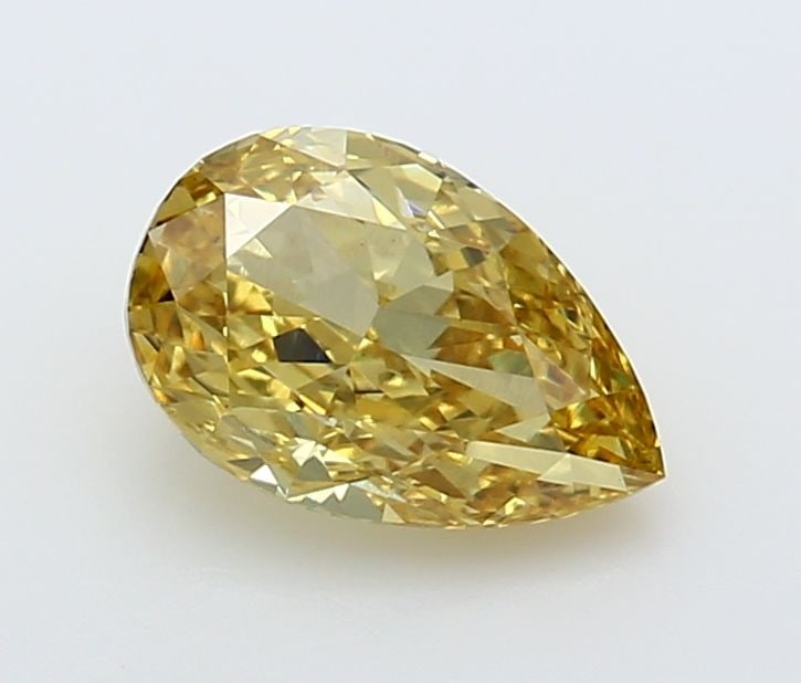 Loose Diamond - PEAR 1.44ct Fancy Vivid Yellow VS1: Loose Diamond - PEAR 1.44ct Fancy Vivid Yellow VS1 Source: This is a real non-mined Diamond that has been grown in a lab Shape: PEAR Carats: 1.44 Color: Fancy Vivid Yellow Certification: IGI Video: