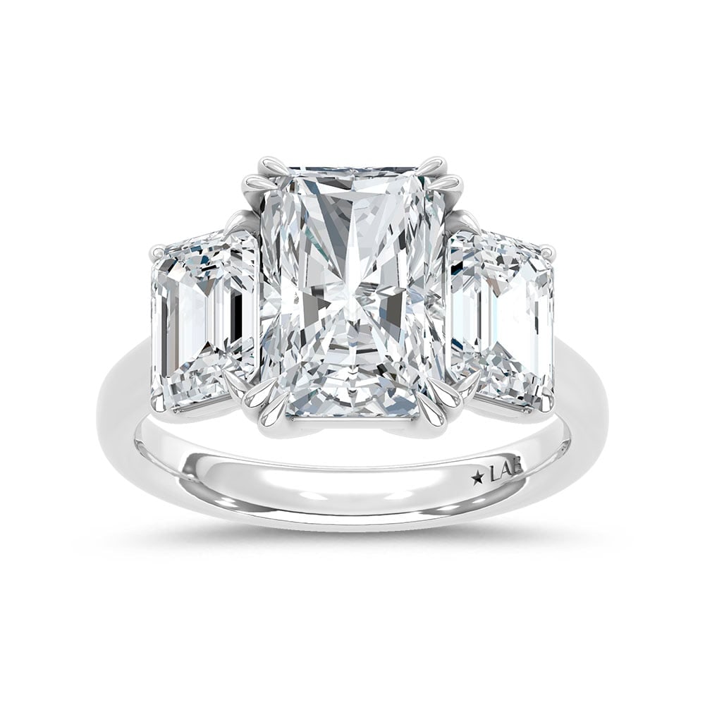 14K White Gold Lab Grown Diamond 5 Ct.Tw. Elongated Radiant Cut Three Stone Engagement Ring: 14K White Gold Lab Grown Diamond 5 Ct.Tw. Elongated Radiant Cut Three Stone Engagement Ring This stunning three-stone ring features a sparkling 3 CT Elong Radiant milestone celebrations. Total
