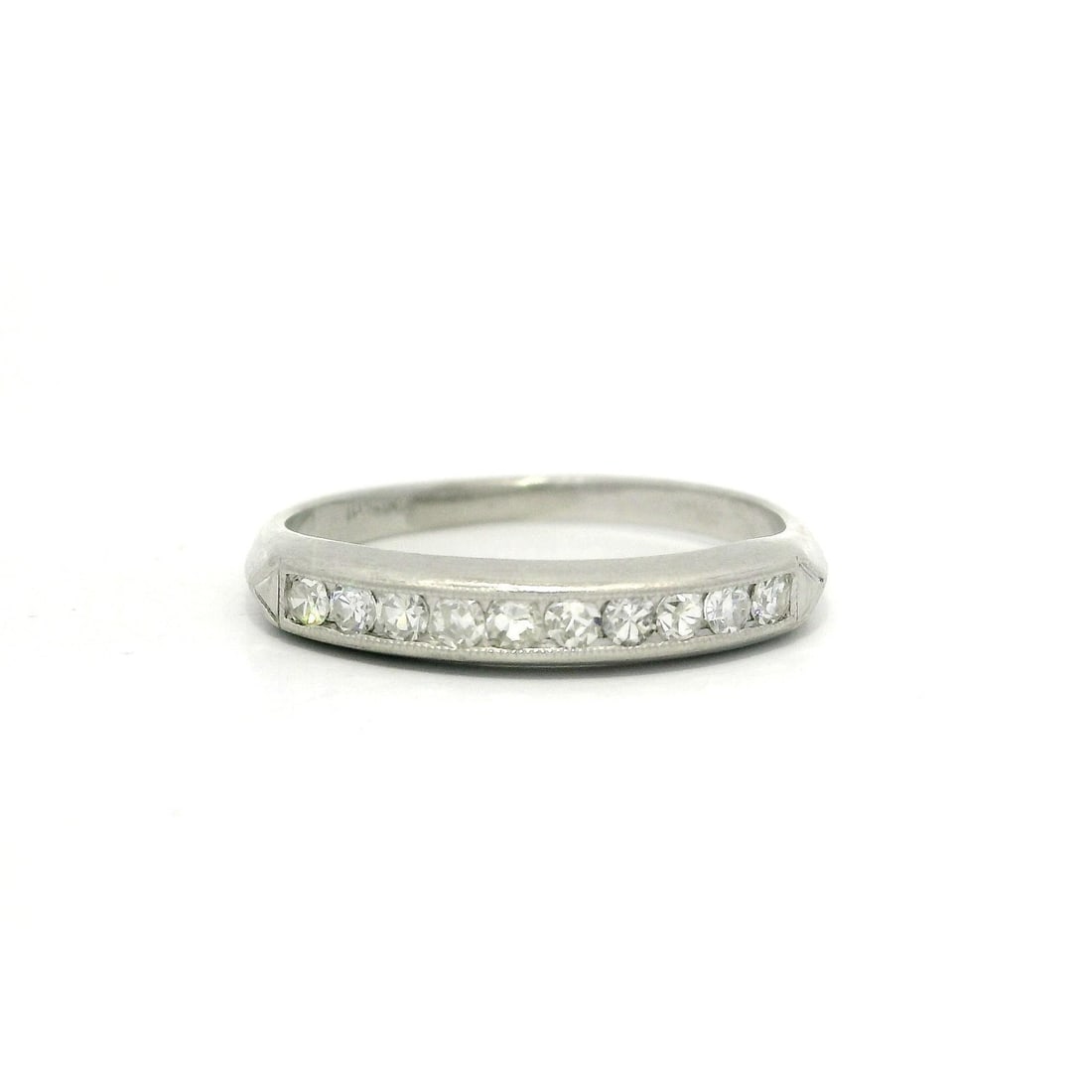 Antique Platinum .20ctw Single Cut Diamond Milgrain Band Ring: Antique Platinum .20ctw Single Cut Diamond Milgrain Band Ring This exquisite antique band ring is crafted in solid .900+ platinum and features a stunning channel set design adorned with ten natural si