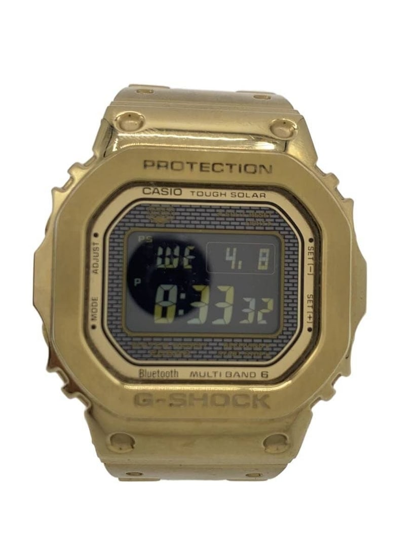 Casio G Shock GMW B5000GD 9JF Gold Stainless Steel Wristwatch: Casio G Shock GMW B5000GD 9JF Gold Stainless Steel Wristwatch This CASIO G-SHOCK Full Metal Series Tough Solar GMW-B5000GD-9JF men's wristwatch features a gold-tone stainless steel case and band. Desi