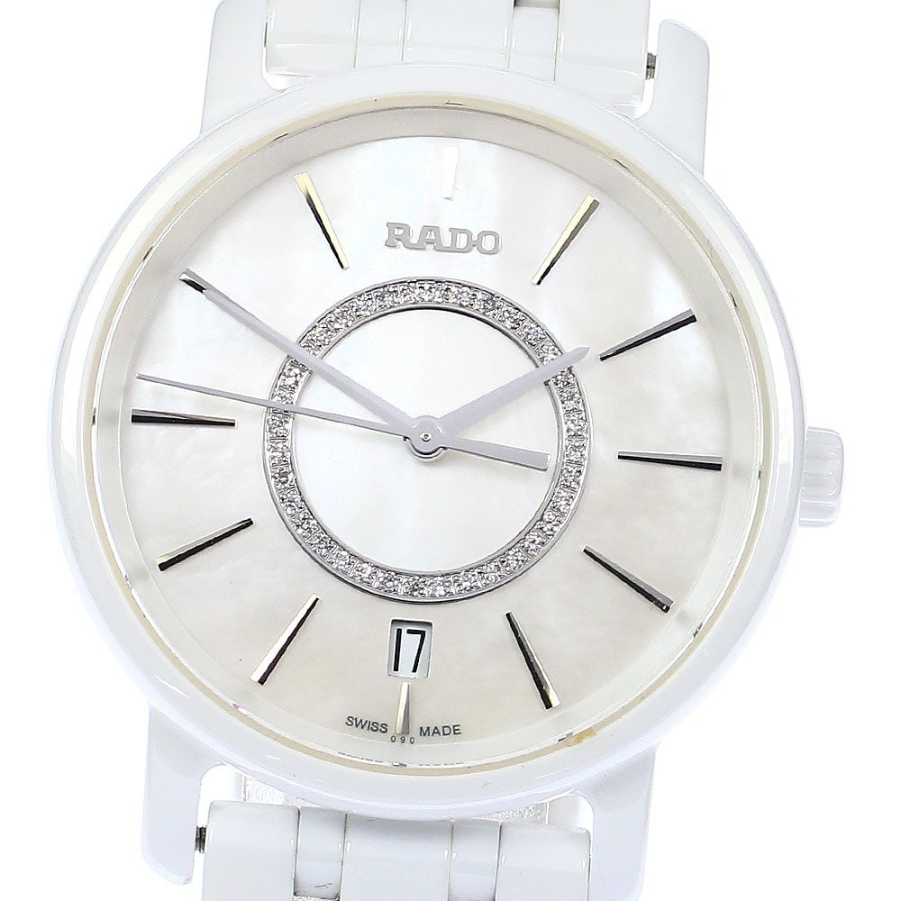 Rado Diamaster quartz date womens ceramic titanium watch 218.0065.3: Rado Diamaster quartz date womens ceramic titanium watch 218.0065.3 This RADO Diamaster Date Quartz women's wristwatch features a ceramic and titanium case and band, offering a blend of durability and