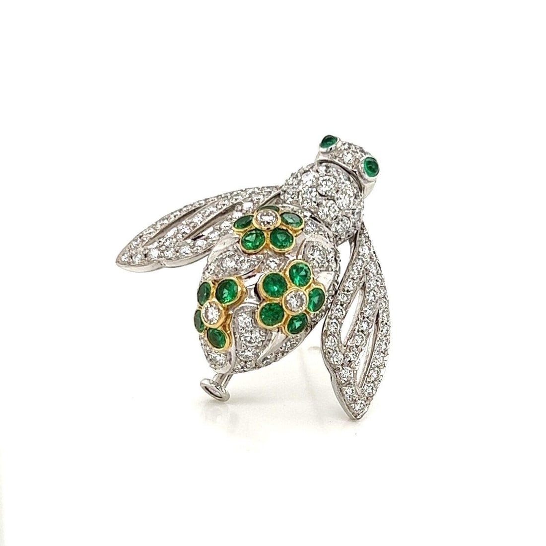 Sabbadini 18k Multi-Tone Gold Bee Brooch with Diamonds and Emeralds: Sabbadini 18k Multi-Tone Gold Bee Brooch with Diamonds and Emeralds An elegant Sabbadini bee brooch crafted in 18k white gold with yellow gold accents, featuring a sculptural bee motif with diamond wi