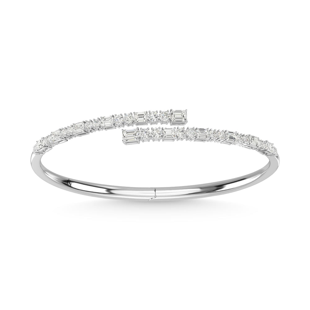 14K White Gold Diamond 2 5/8 Ct.Tw. Fashion Bangle: 14K White Gold Diamond 2 5/8 Ct.Tw. Fashion Bangle 14k White Gold Stone Color: G-h Stone Clarity: Si1 This item may take 2-5 weeks for shipping. The Diamond Depot Guarantee: All items in this auction 