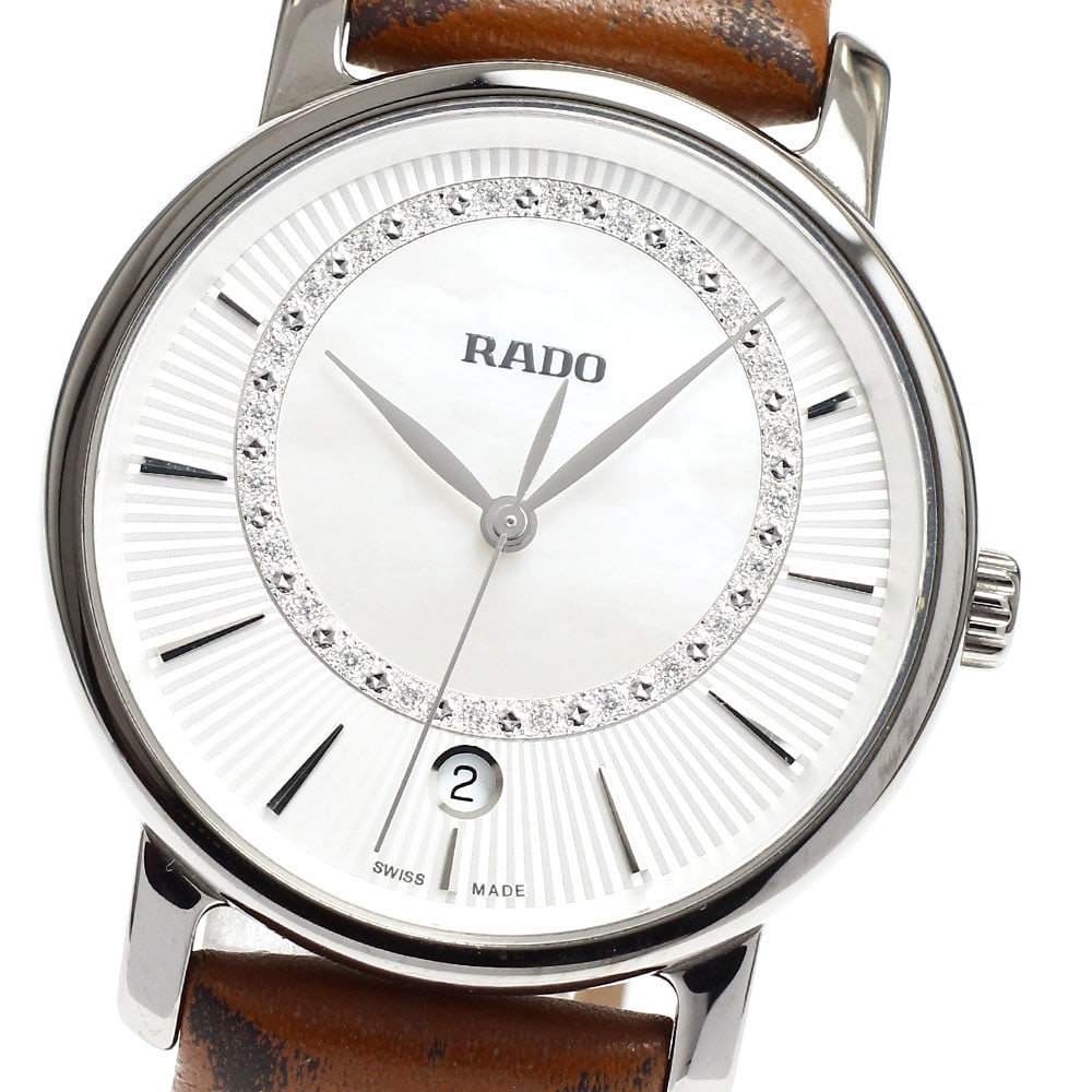 RADO DiaMaster Quartz Date Ladies Ceramic Watch R14064945: RADO DiaMaster Quartz Date Ladies Ceramic Watch R14064945 This RADO DiaMaster women's wristwatch features a sleek ceramic case paired with a leather strap and a silver/white shell dial. Powered by a r
