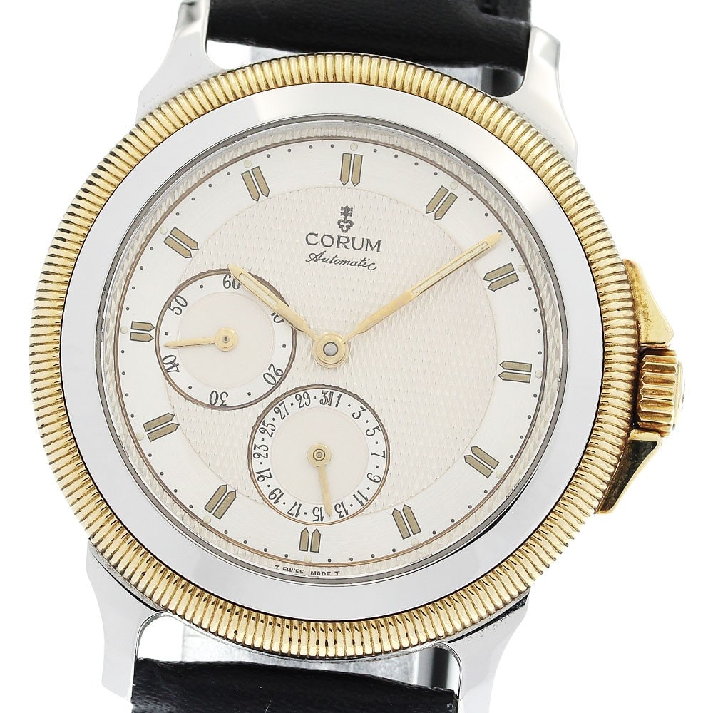 CORUM 74.111.21 automatic mens wristwatch with date small seconds: CORUM 74.111.21 automatic mens wristwatch with date small seconds CORUM automatic men's wristwatch with date and small seconds display. This pre-owned timepiece is of Swiss origin and is identified as
