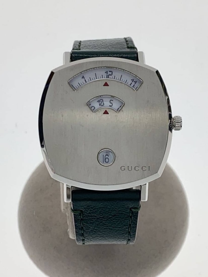 Gucci Grip Silver Quartz Men's Wristwatch: Gucci Grip Silver Quartz Men's Wristwatch This is a pre-owned GUCCI Grip Quartz 157.4 men's wristwatch featuring a silver-tone case and band. The watch is Swiss-made and displays slight signs of use, 