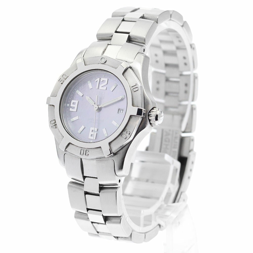 TAG Heuer Exclusive blue dial quartz date wristwatch: TAG Heuer Exclusive blue dial quartz date wristwatch This TAG HEUER Exclusive Date Quartz women's wristwatch features a blue shell dial and is crafted from stainless steel. The watch is equipped with 