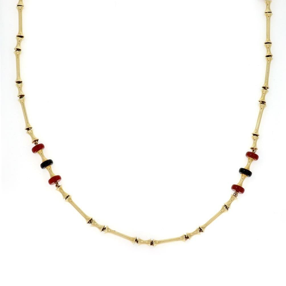 Vintage 14k Yellow Gold Onyx Carnelian Bar Link Necklace 38": Vintage 14k Yellow Gold Onyx Carnelian Bar Link Necklace 38" This exquisite vintage necklace showcases a stunning design crafted from 14k yellow gold with a polished finish. The necklace features an e