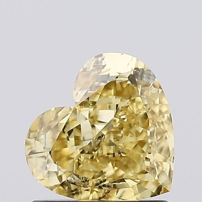 Loose Diamond - HEART 1.03ct Fancy Intense Yellow VS2: Loose Diamond - HEART 1.03ct Fancy Intense Yellow VS2 Source: This is a real non-mined Diamond that has been grown in a lab Shape: HEART Carats: 1.03 Color: Fancy Intense Yellow Certification: IGI Vid