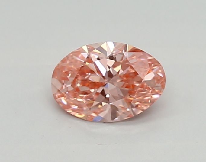 Loose Diamond - OVAL 0.39ct Fancy Vivid Pink VVS2: Loose Diamond - OVAL 0.39ct Fancy Vivid Pink VVS2 Source: This is a real non-mined Diamond that has been grown in a lab Shape: OVAL Carats: 0.39 Color: Fancy Vivid Pink Certification: IGI Video: