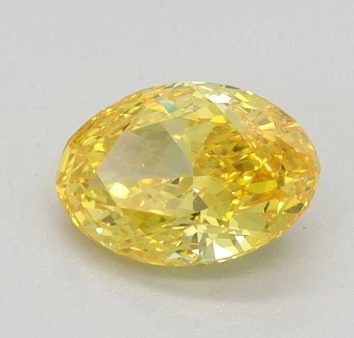 Loose Diamond - OVAL 0.6ct Fancy Vivid Yellow VVS2: Loose Diamond - OVAL 0.6ct Fancy Vivid Yellow VVS2 Source: This is a real non-mined Diamond that has been grown in a lab Shape: OVAL Carats: 0.6 Color: Fancy Vivid Yellow Certification: IGI Video: