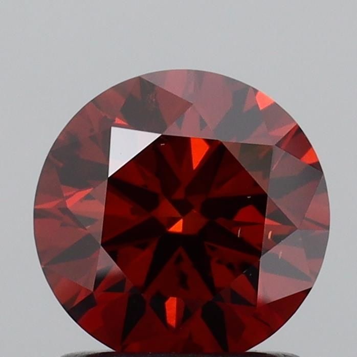 Loose Diamond - ROUND 1.01ct Fancy Deep Orange SI1: Loose Diamond - ROUND 1.01ct Fancy Deep Orange SI1 Source: This is a real non-mined Diamond that has been grown in a lab Shape: ROUND Carats: 1.01 Color: Fancy Deep Orange Certification: IGI Video: